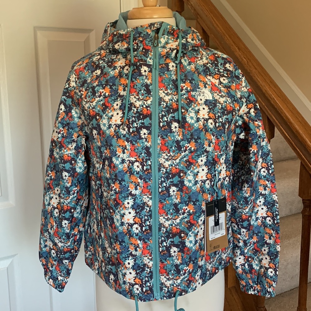 The North Face Floral Print Hooded Jacket in Teal, Orange, White.